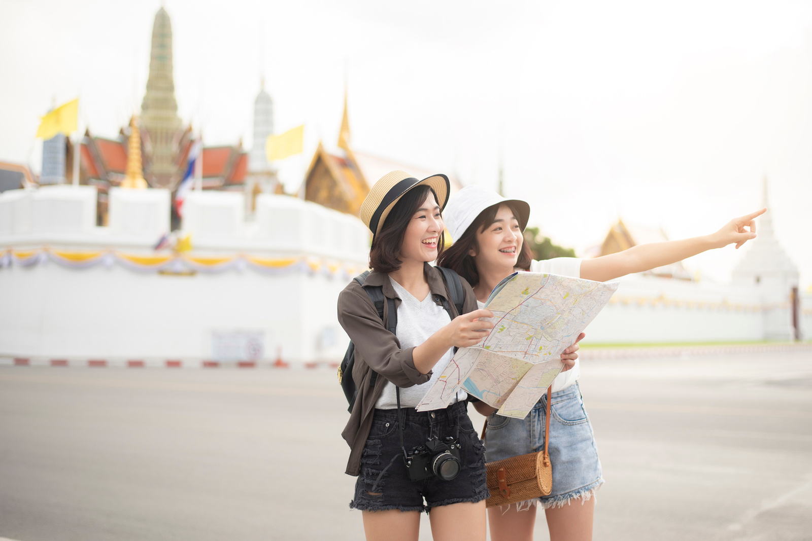 Smiling Woman Holding Map